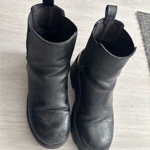 Well worn winter Black faux-Leather boots
